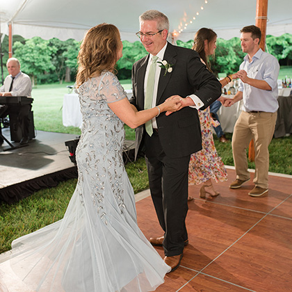 Couple dancing during a wedding reception at Hidden View Farm in Annapolis, Maryland. Photo taken by Carly Fuller.